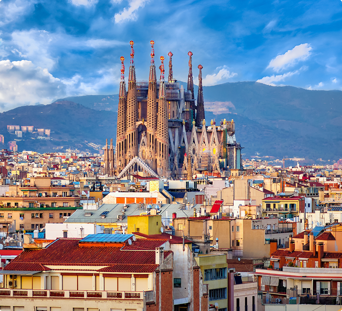 Barcelona skyline with the Sagrada Família and mountains behind